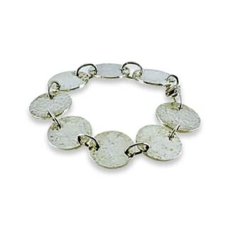 Sterling silver bracelet with hammered silver discs.